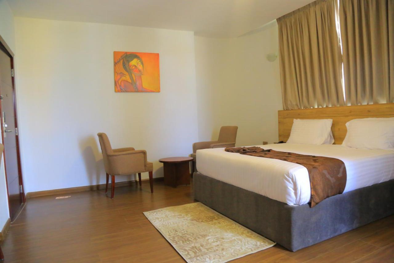 Black Horse Hotel Apartment Addis Ababa Exterior photo